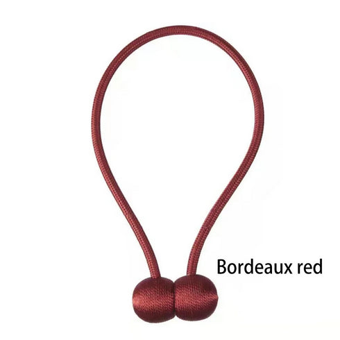 Rope curtain tieback